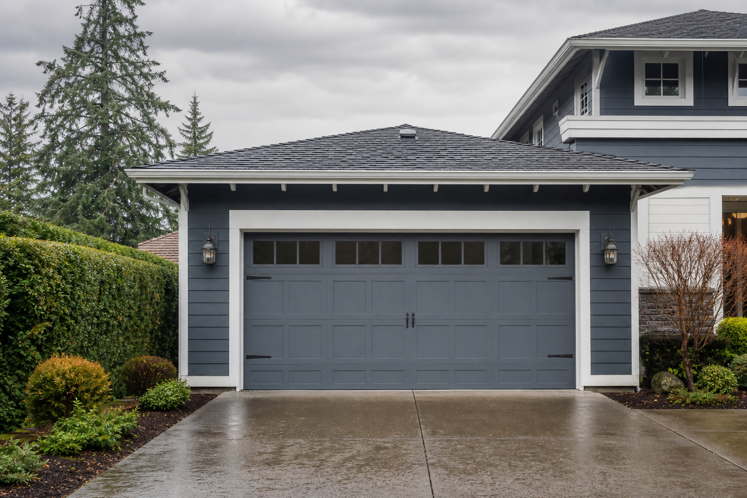 Residential garage door exterior in Yarrow Point, WA with visible hardware wear